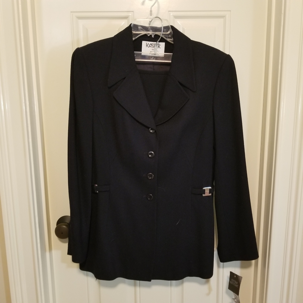 Beautiful classic navy blue wool suit by Kasper.  New with tags.  Size 8.